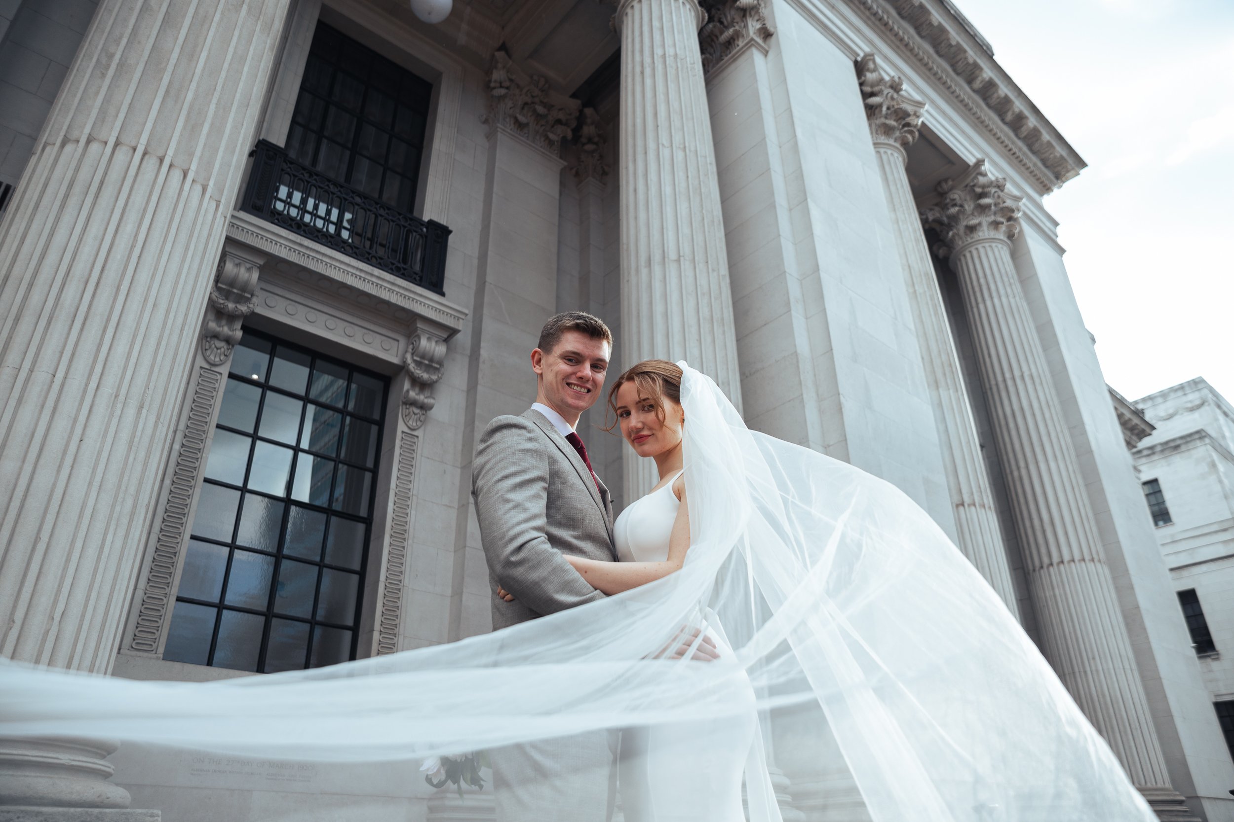 couple in front of the old Marylebone town hall in London