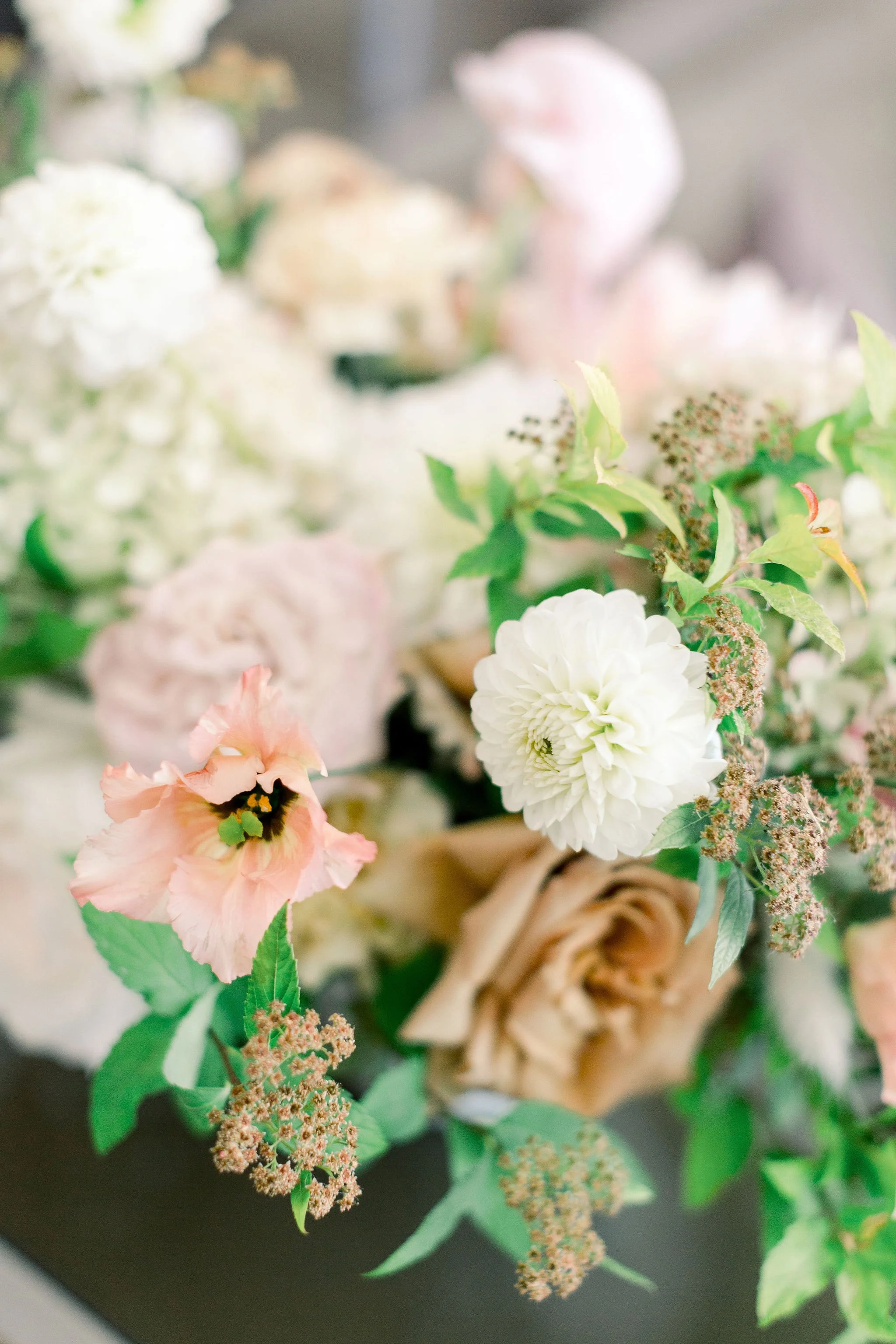 Fall flowers of white dahlias, pink lisianthks, and taupe roses for Twig & Bloom Regina