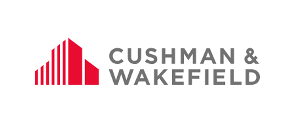 Logo of Cushman & Wakefield featuring a red geometric building graphic and gray text