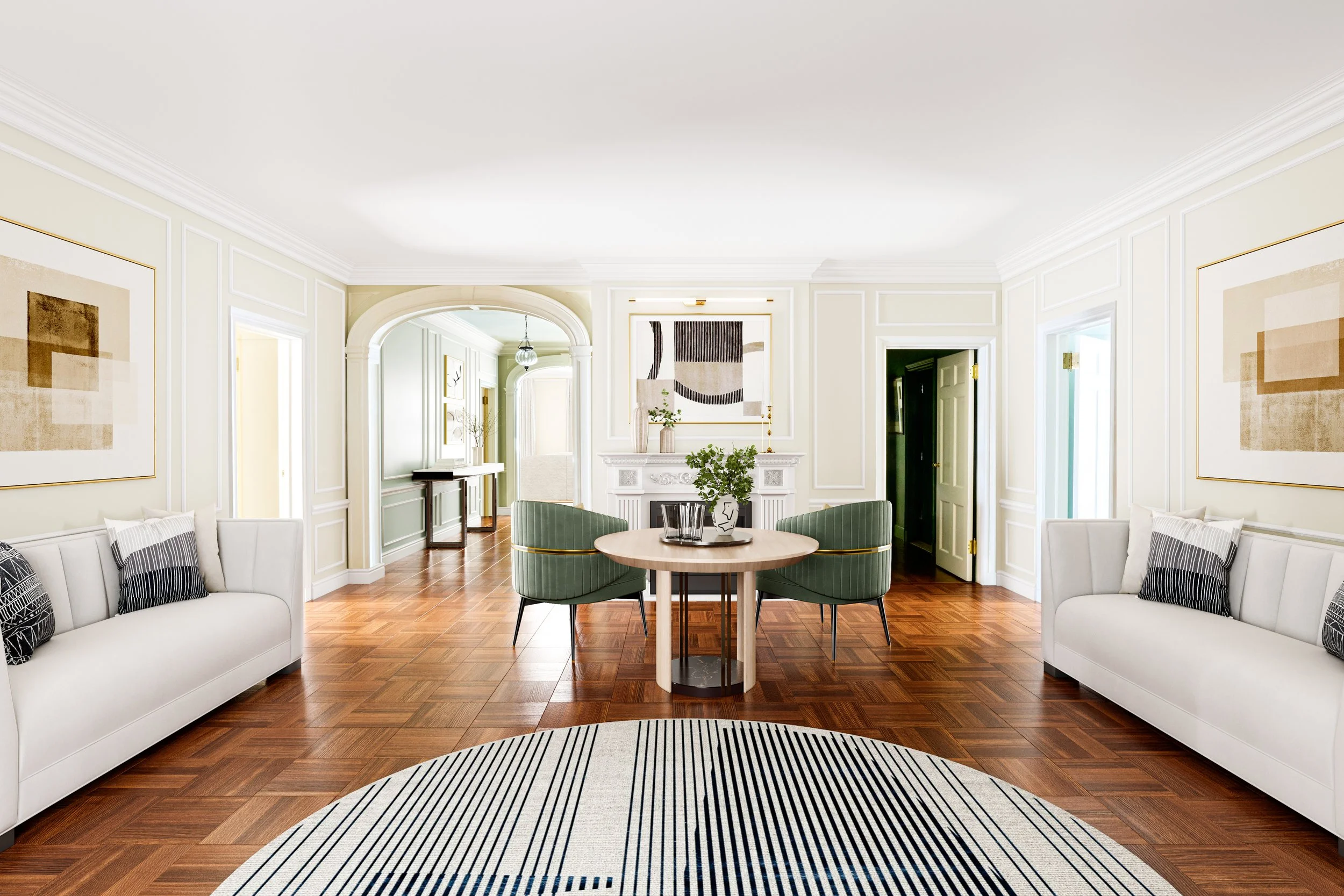 A spacious, elegantly decorated living room with white walls, hardwood floors, white sofas with black and white pillows, a round wooden table with green chairs, above a striped rug, and artwork on the walls.