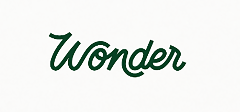 The word 'Wonder' written in dark green cursive font on a white background.