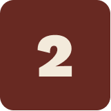Number 2 on a brown background