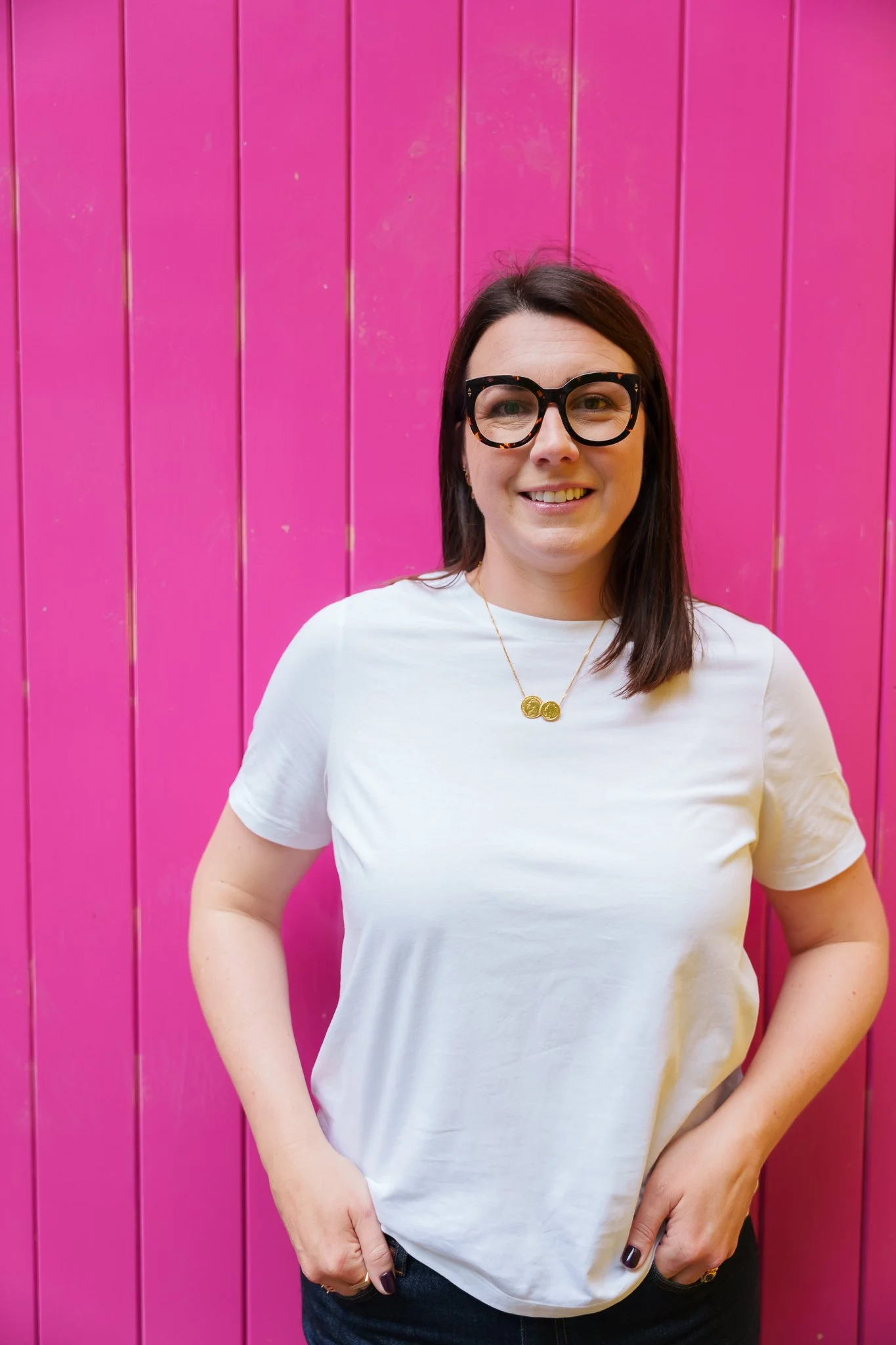 Harriet Cox on a pink background