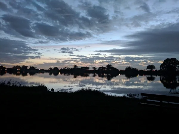 After sunset dark dusk view across lake