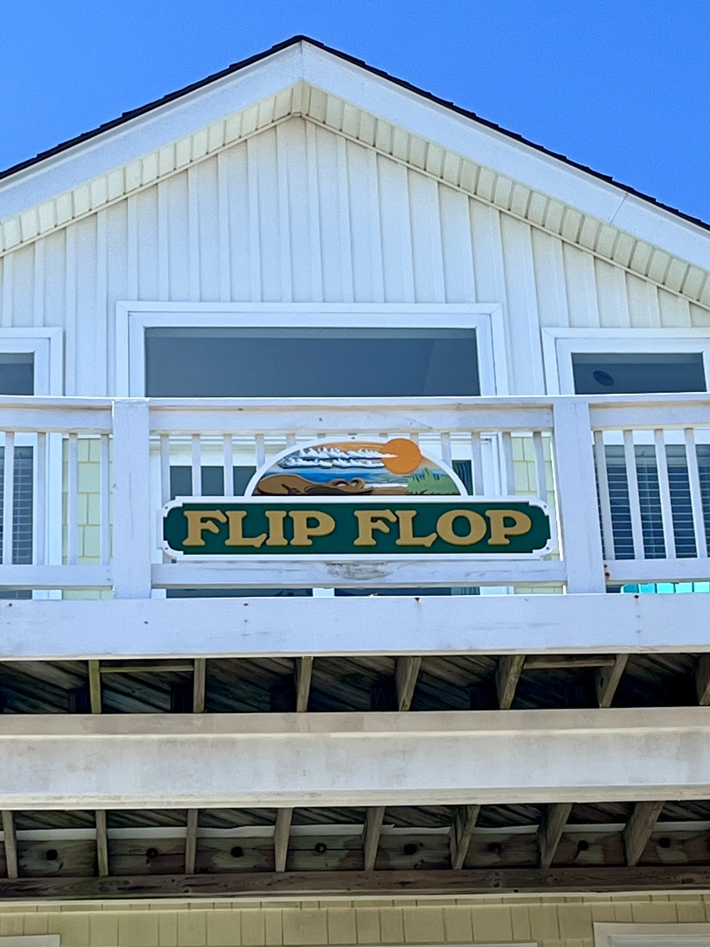 flip flop beach house sign.jpeg
