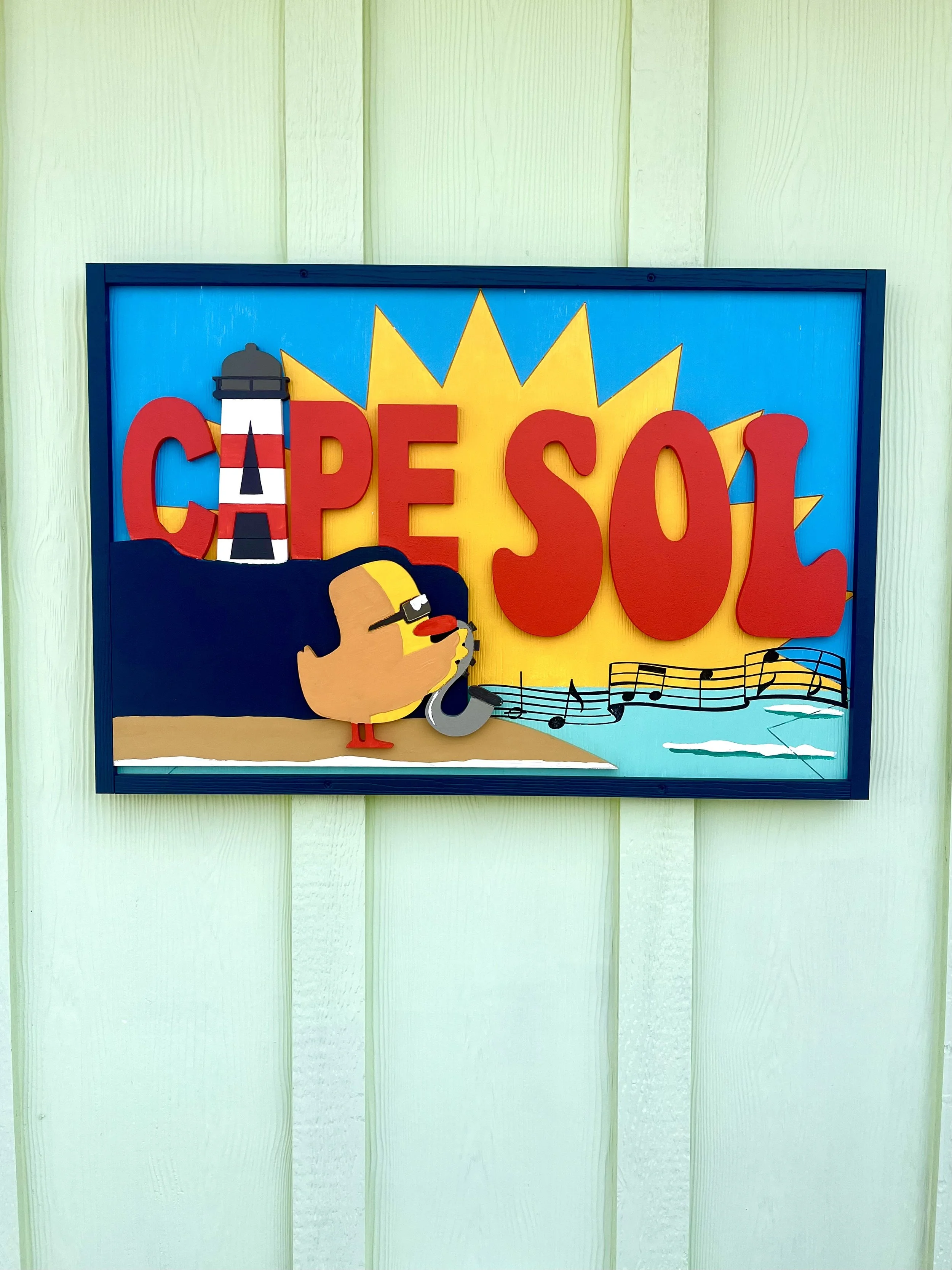 cape sol beach house sign.jpeg