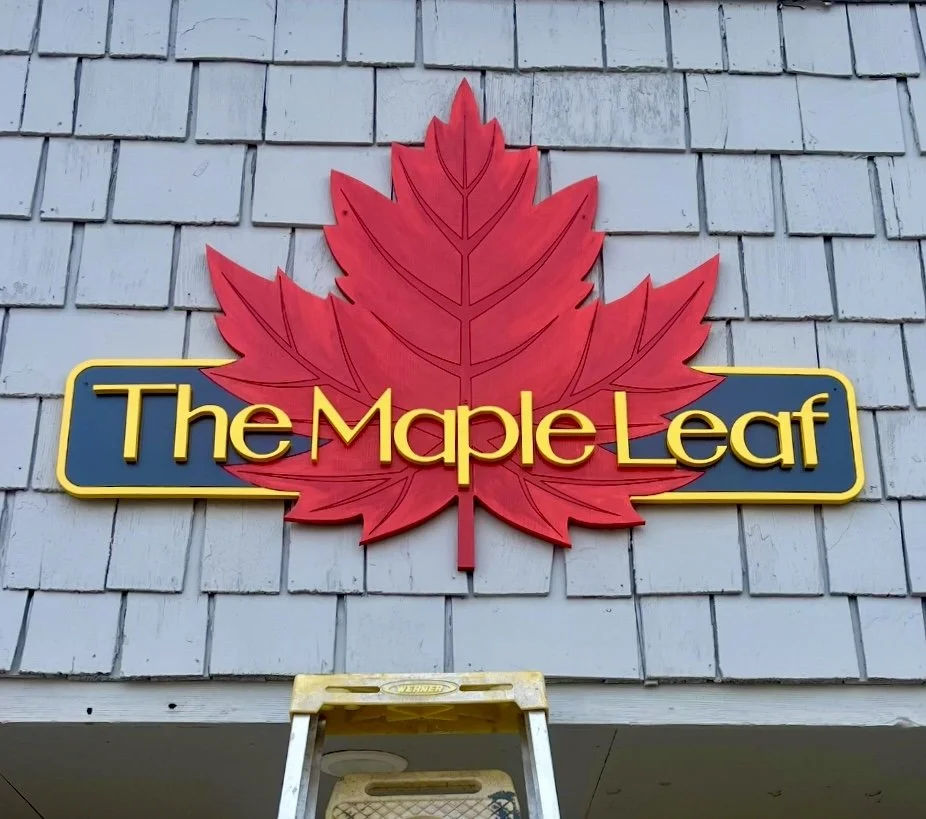 the maple leaf beach house sign.jpg