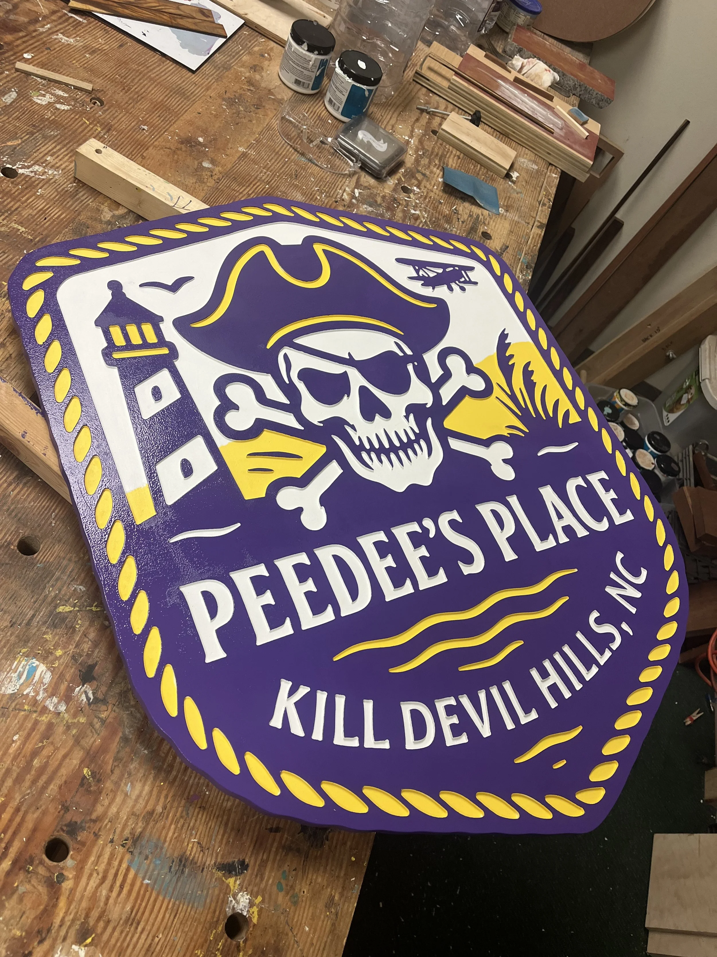 peedees place beach house sign.jpeg