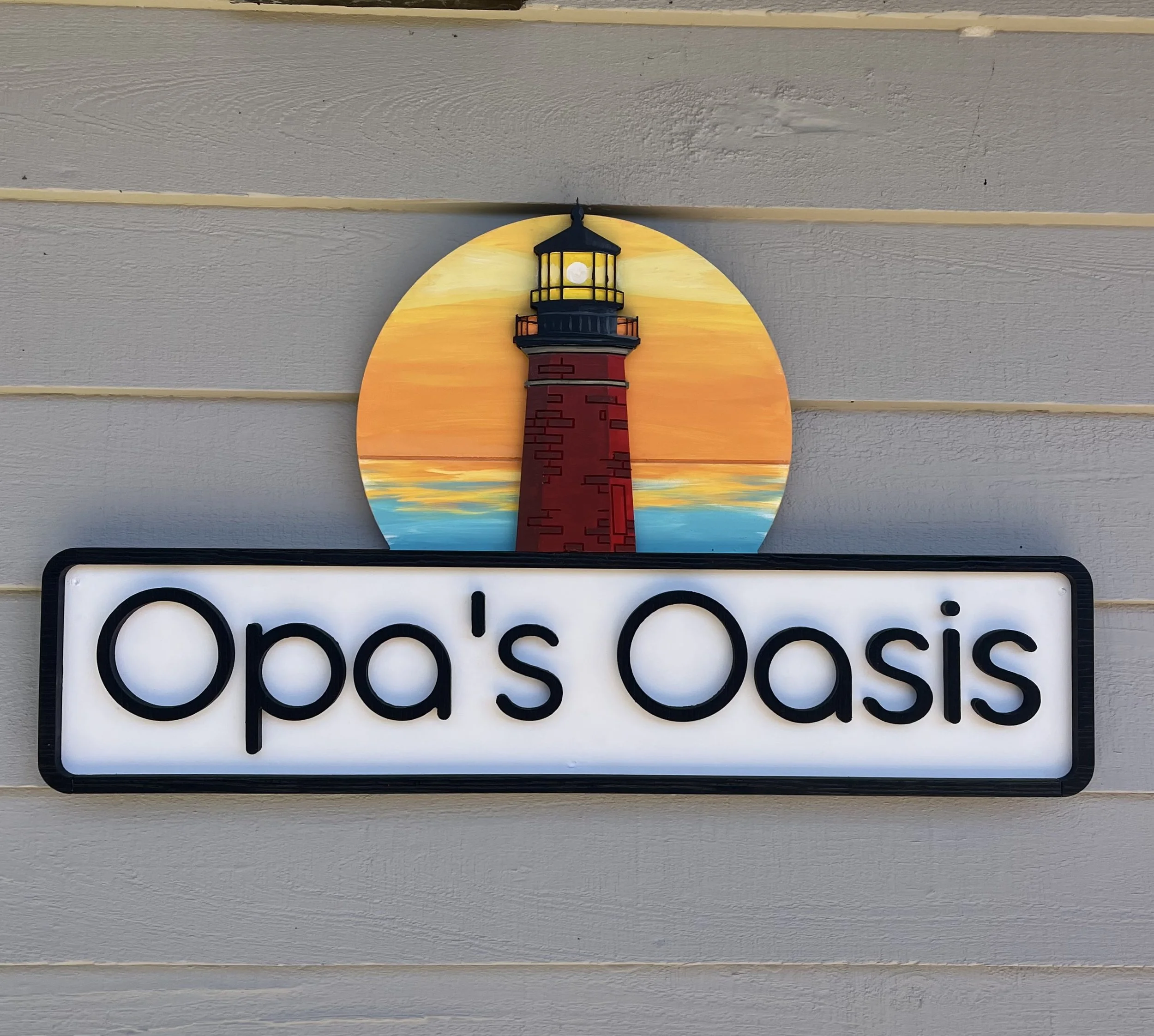 opas oasis beach house sign.jpeg