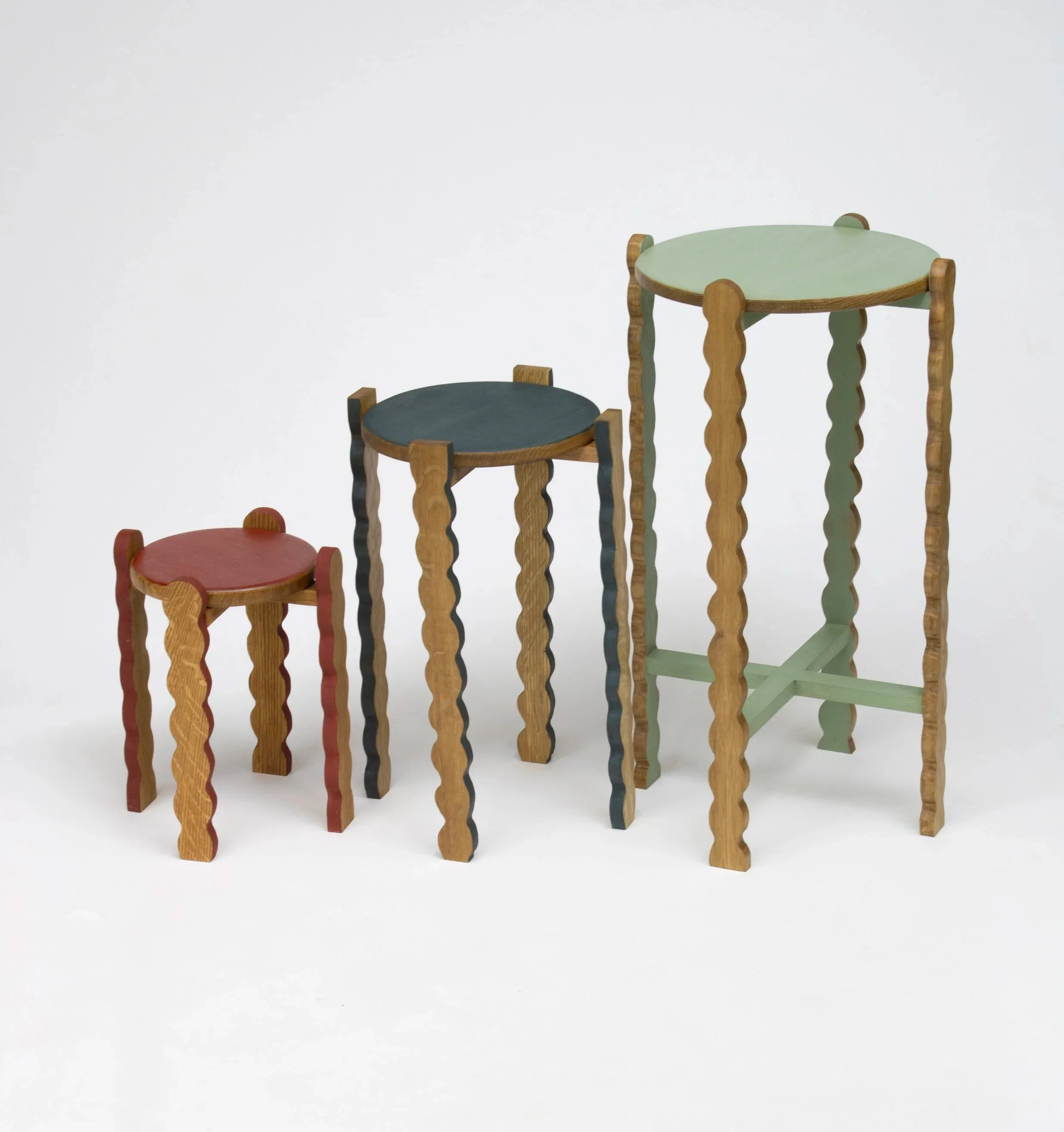 Toryn Black Design handmade plant stands made with Oak. Each features scalloped legs, sturdy joinery, and is finished with colorful milk paint. This photo shows each of the 3 sizes available. 