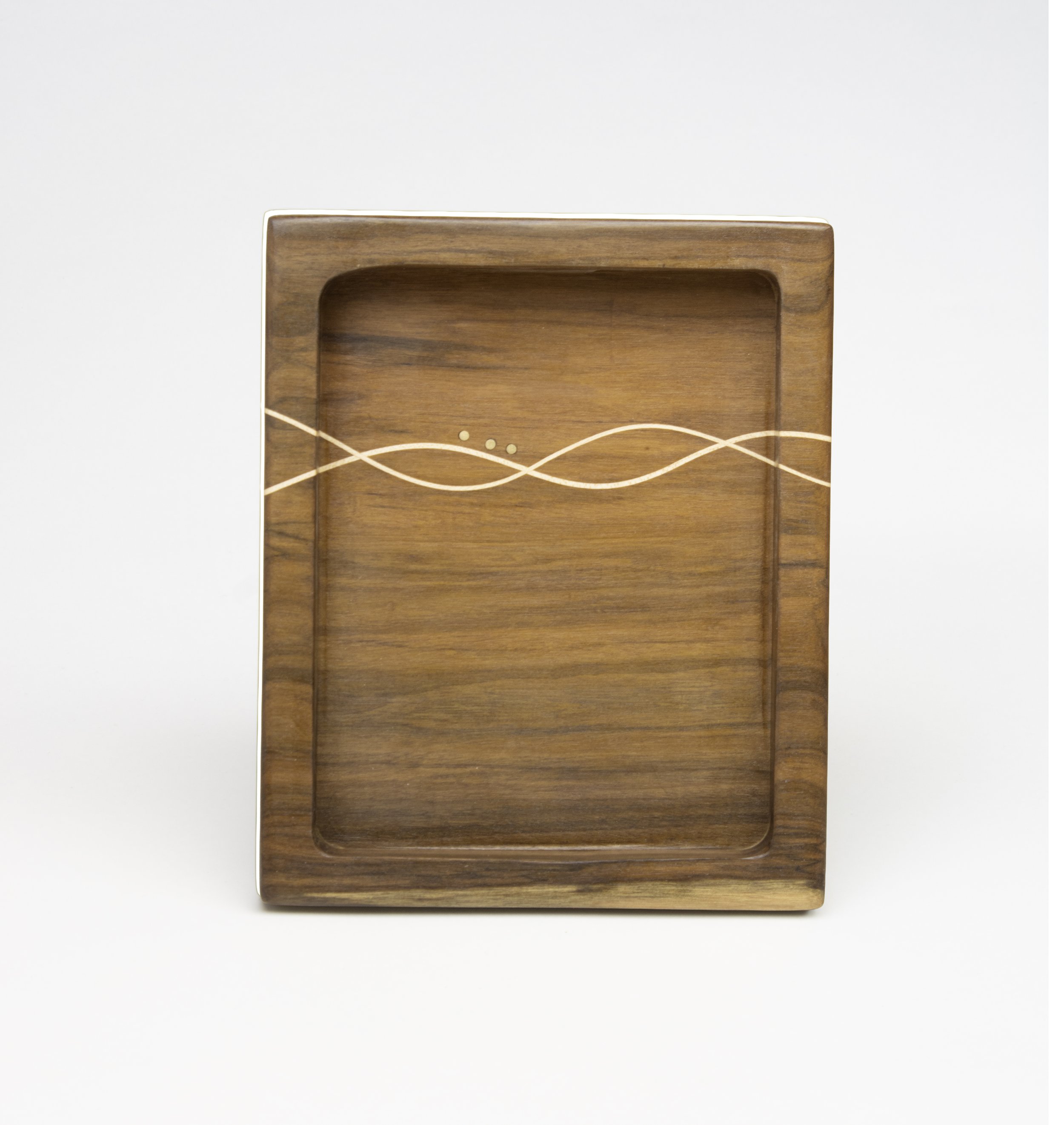 Handcrafted small catch-all tray by Toryn Black Design, featuring an intricate woven maple veneer pattern and brass inlay. Made in Western North Carolina, this distinctive wooden tray combines contemporary design, decorative inlay, and fine woodworki