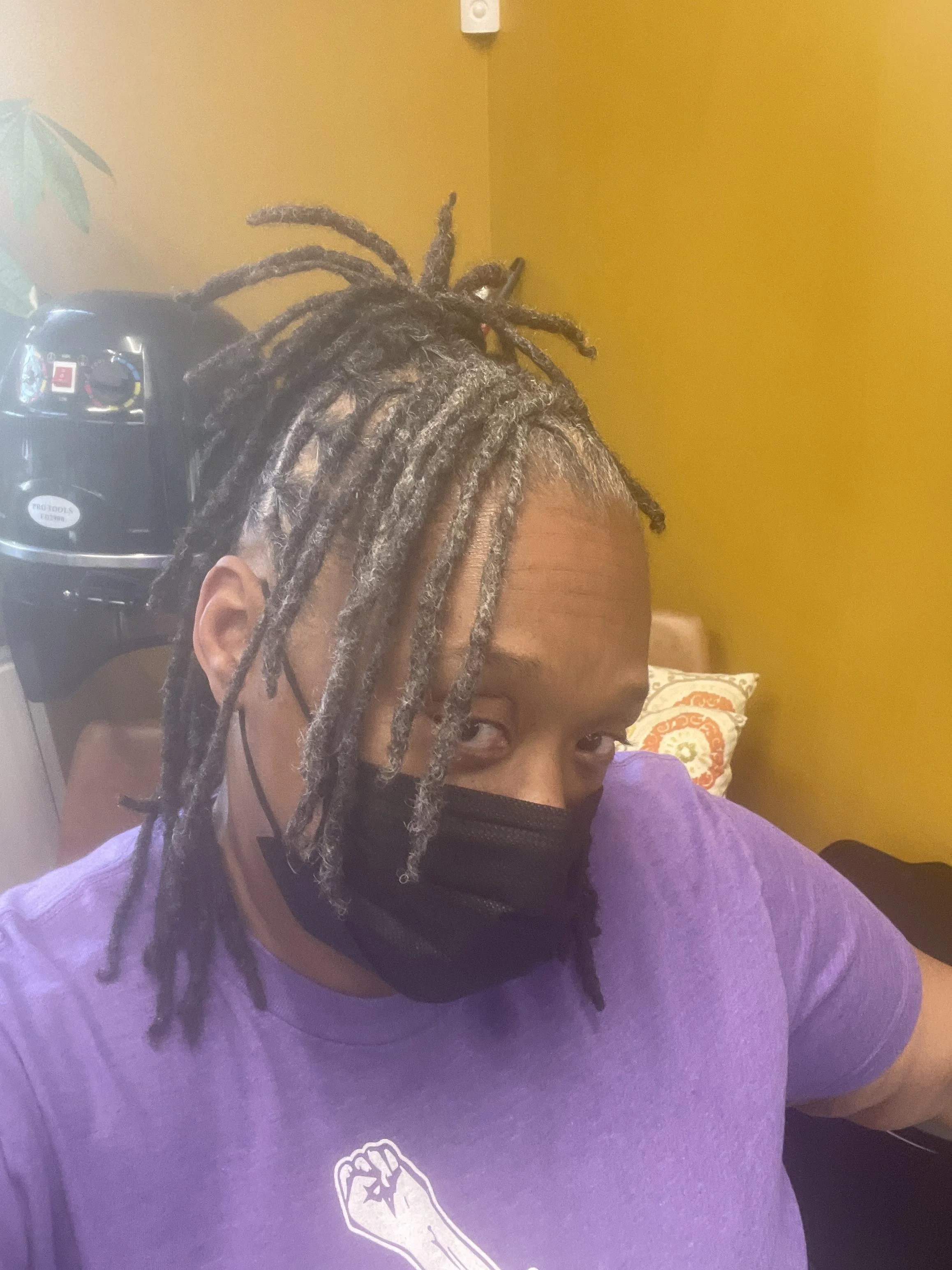 Deon Haywood, Executive Director of Women with a Vision let us love on her locs