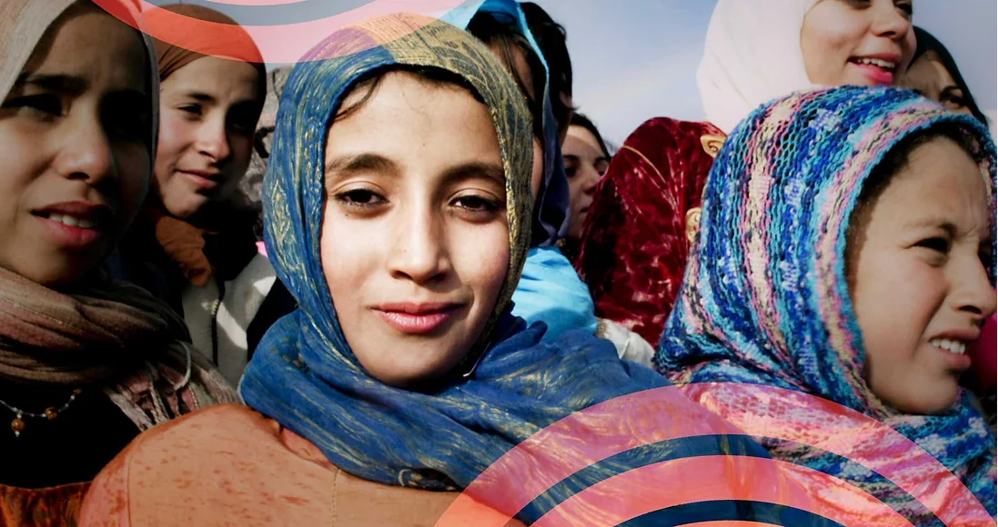 Group of adolescent Afghan girls in headscarves.png