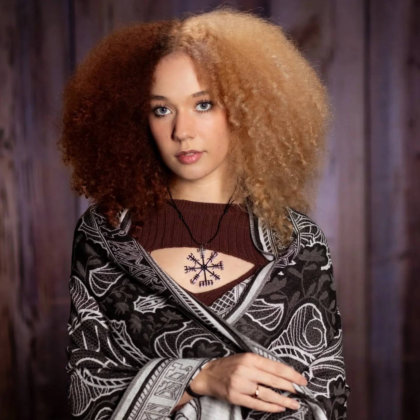 The sorceress waits for you in her Wanderers scarf.