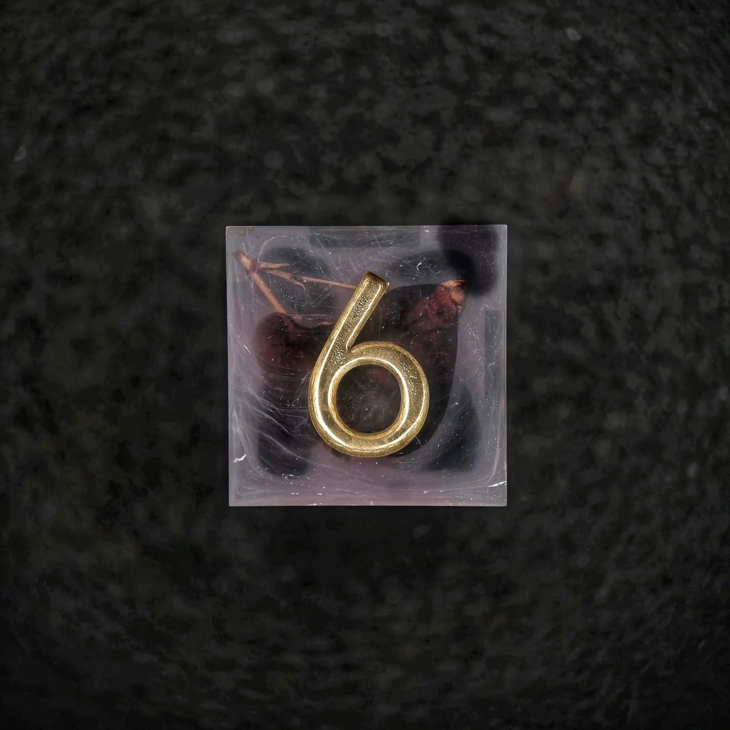 &bull;Roseglass Elegy&bull;

They say the flowers were placed before the farewell was spoken.

Cast in rose-tinted glass and sealed before they could wilt, these relics hold the moment just before loss. The last warmth of a hand. The breath not yet g