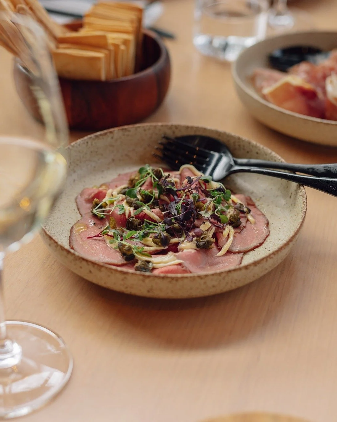 ✨ Perfect Pairing ✨

Experience the harmony of our Vitello Tonnato with the crisp elegance of the 2025 Gruner Veltliner.

Fresh and full of flavour, this dish meets its perfect match in a wine that lifts and complements every bite. Join us in our res