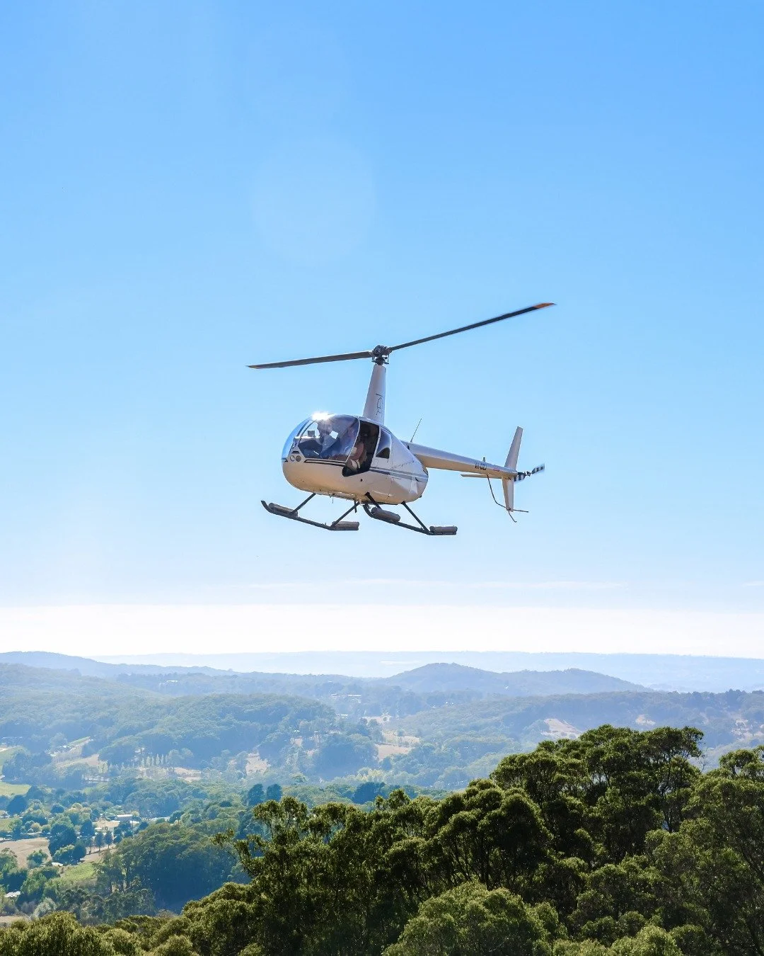 SKY CELLAR EXPERIENCE 🚁

Take your day to new heights with our Sky Cellar Experience. Begin with a breath-taking 30-minute helicopter flight, soaring over rolling hills, patchwork vineyards, and sweeping countryside views. Upon landing at Longview, 