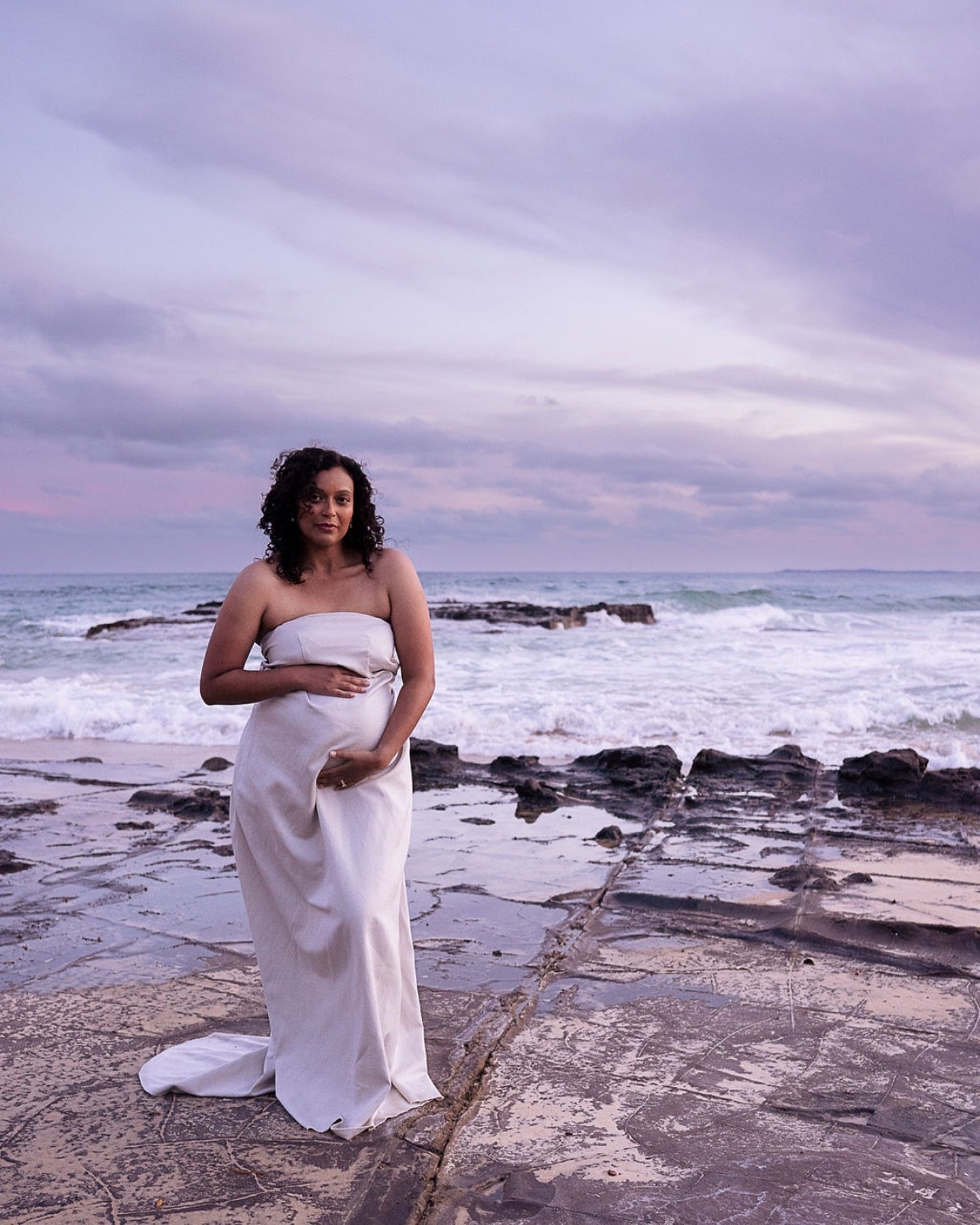 Embracing the moment before the second born arrives.