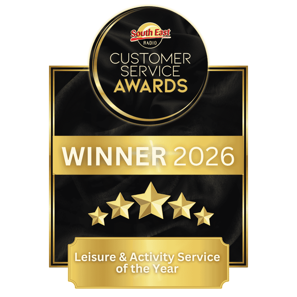 Award badge for South East Radio Customer Service Awards 2026, indicating winner of Leisure & Activity Service of the Year. The badge features a black and gold color scheme with five gold stars.