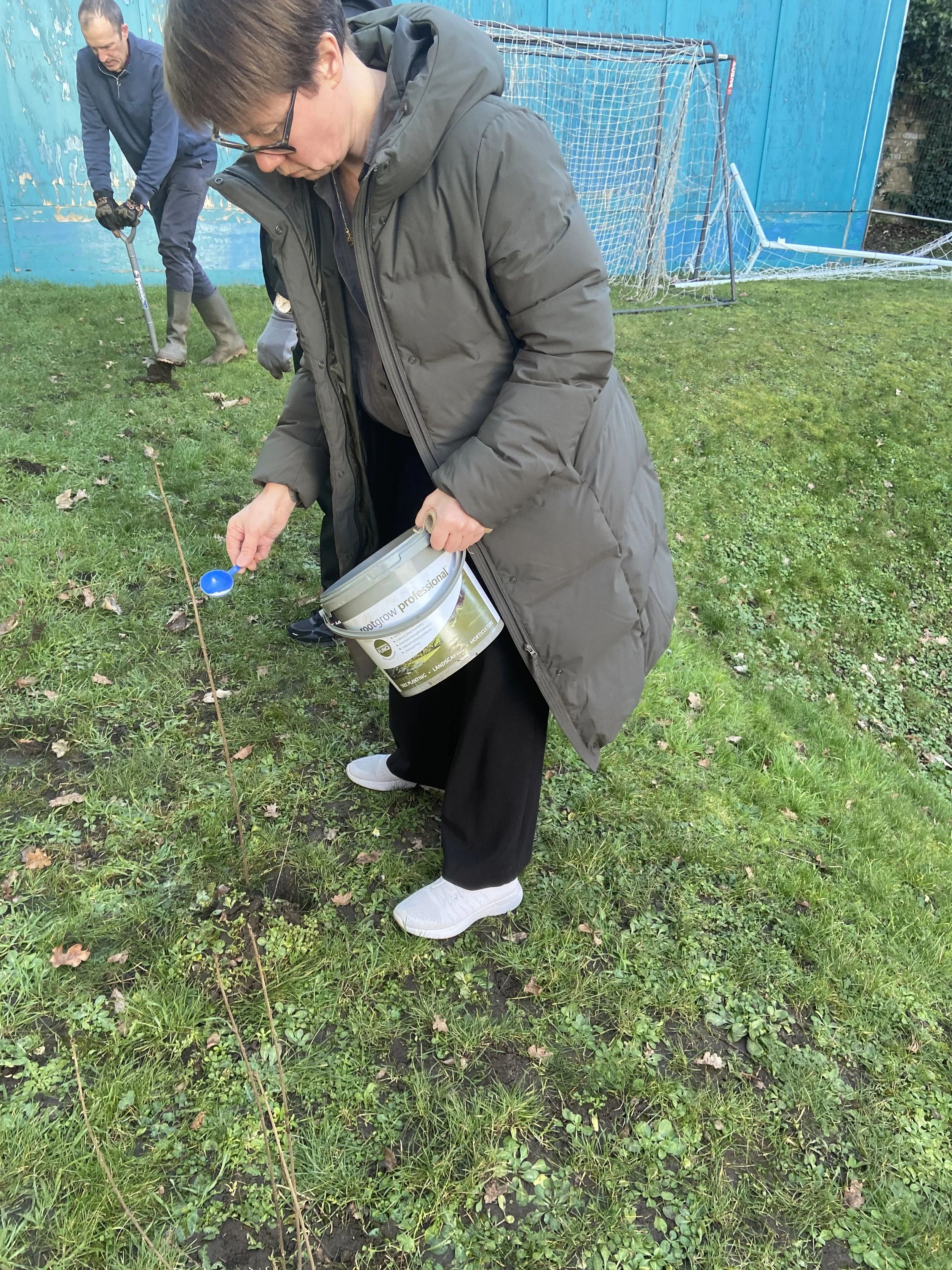 Teachers from Hampstead School planting a native hedge to support biodiversity and create wildlife habitats.