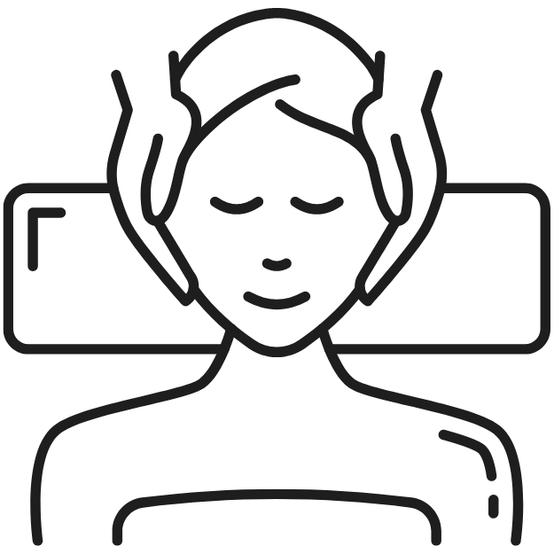 a person receiving a facial treatment