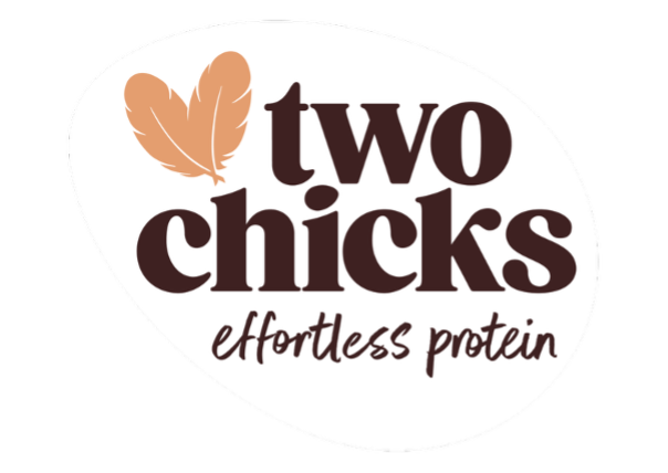 Logo with two feathers and the text "two chicks" and "effortless protein" in a white oval shape