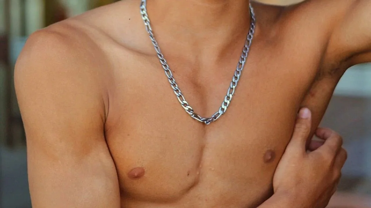Close-up of a man’s chest and shoulders