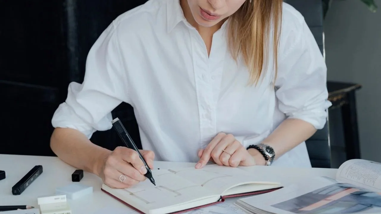 Woman marking a calendar