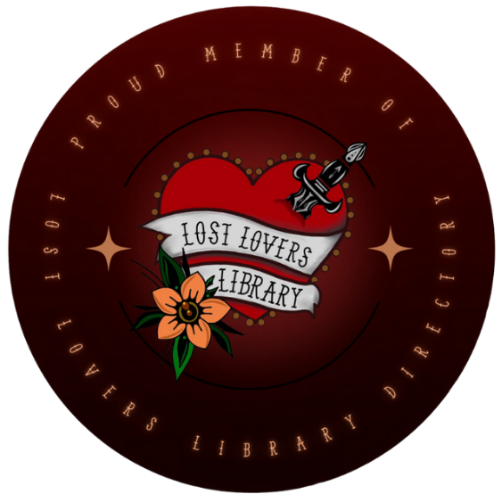 A circular logo with a dark red background featuring a heart with a banner reading 'Lost Lovers' and 'Library', a tattoo-style dagger piercing the heart, and orange flowers with green leaves. The outer ring includes text that says 'Proud Member of LGBTQ+ Lovers Library Directory'.