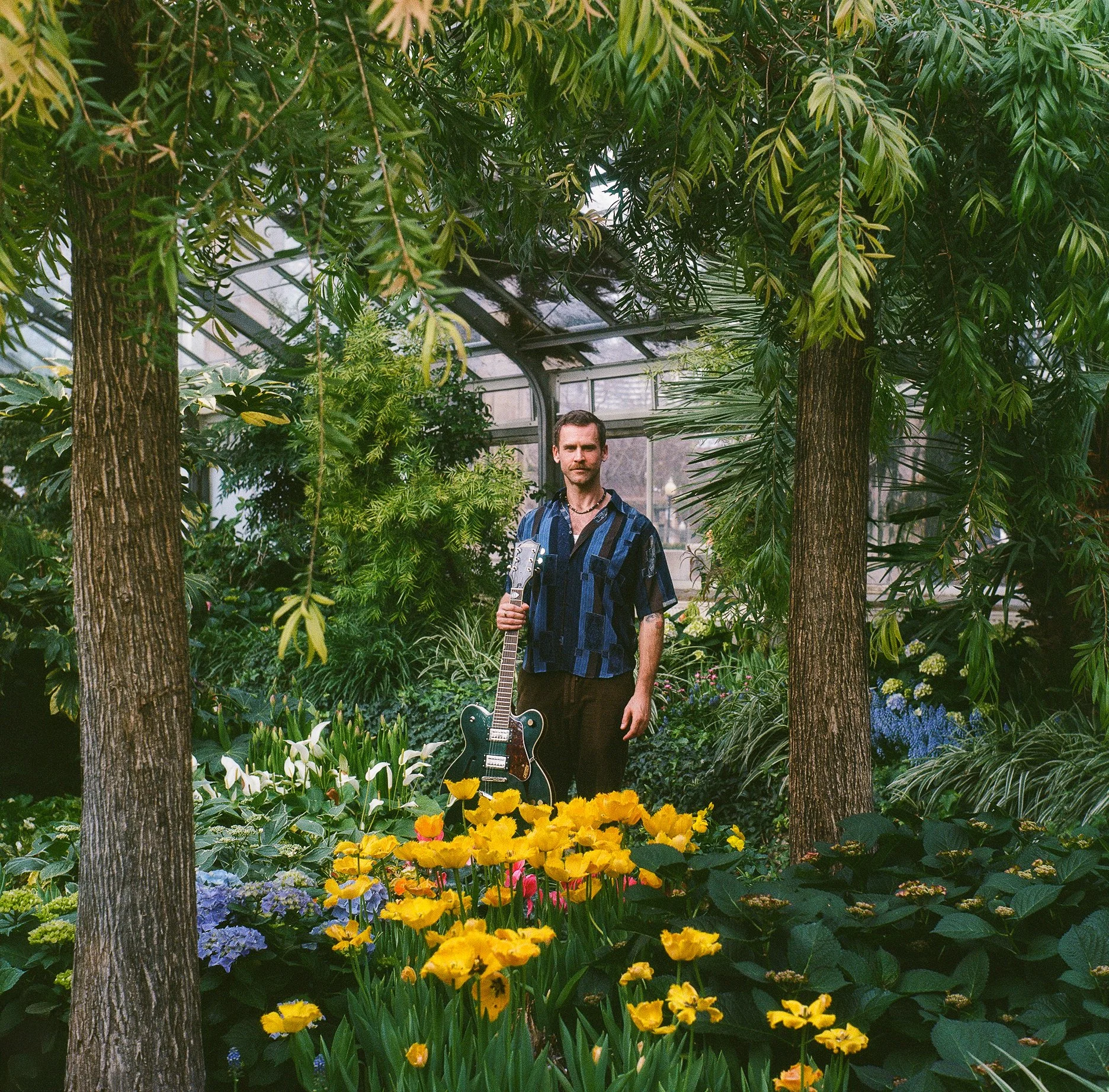 AndrewFleming-TysonCoady-Musician-Songwriter-Guitar-AllanGardensConservatory-Toronto-Green-Plants-Flowers-MediumFormat-Film-KodakPortra400.jpg