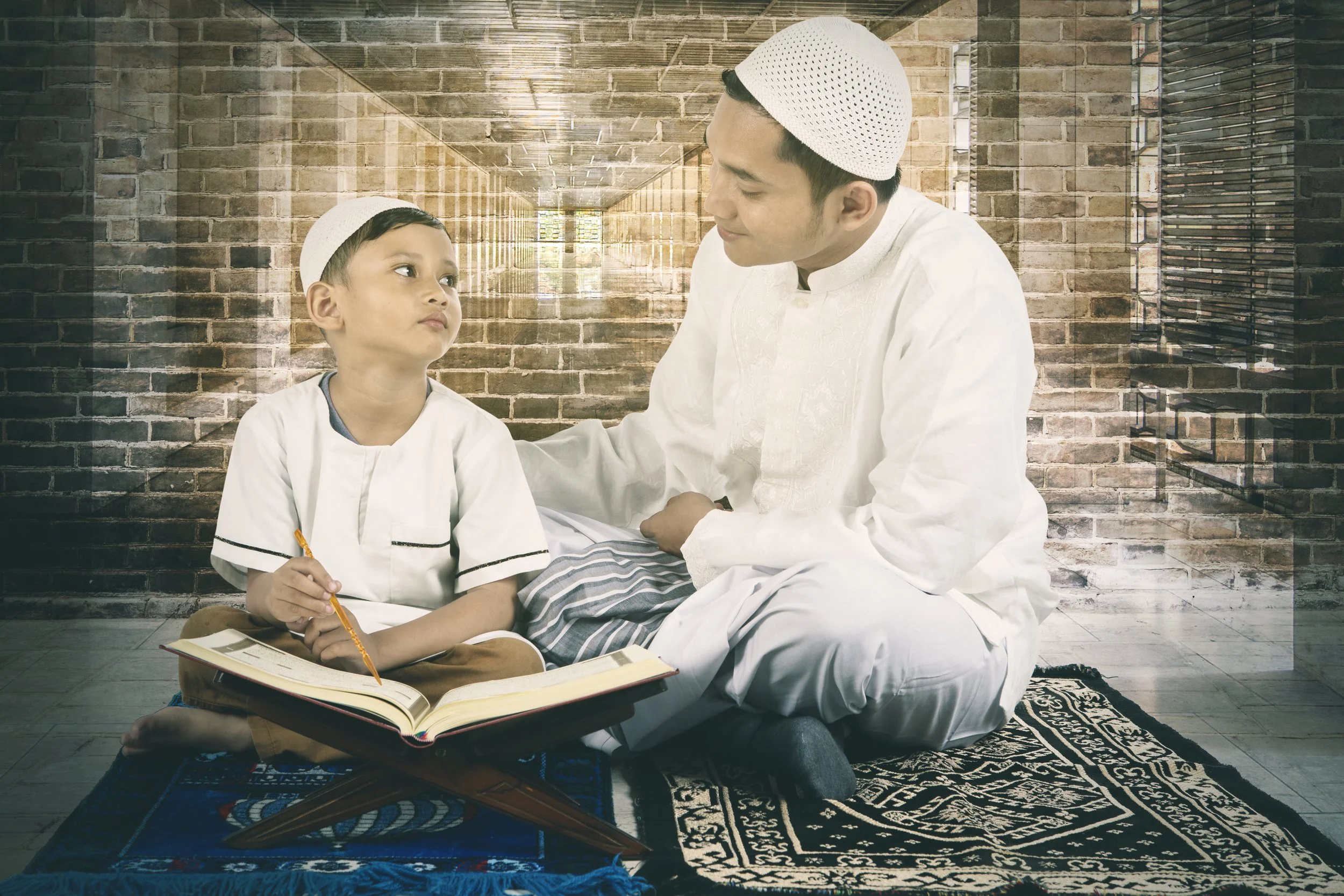 muslim-young-man-teaching-his-son-read-quran.jpg