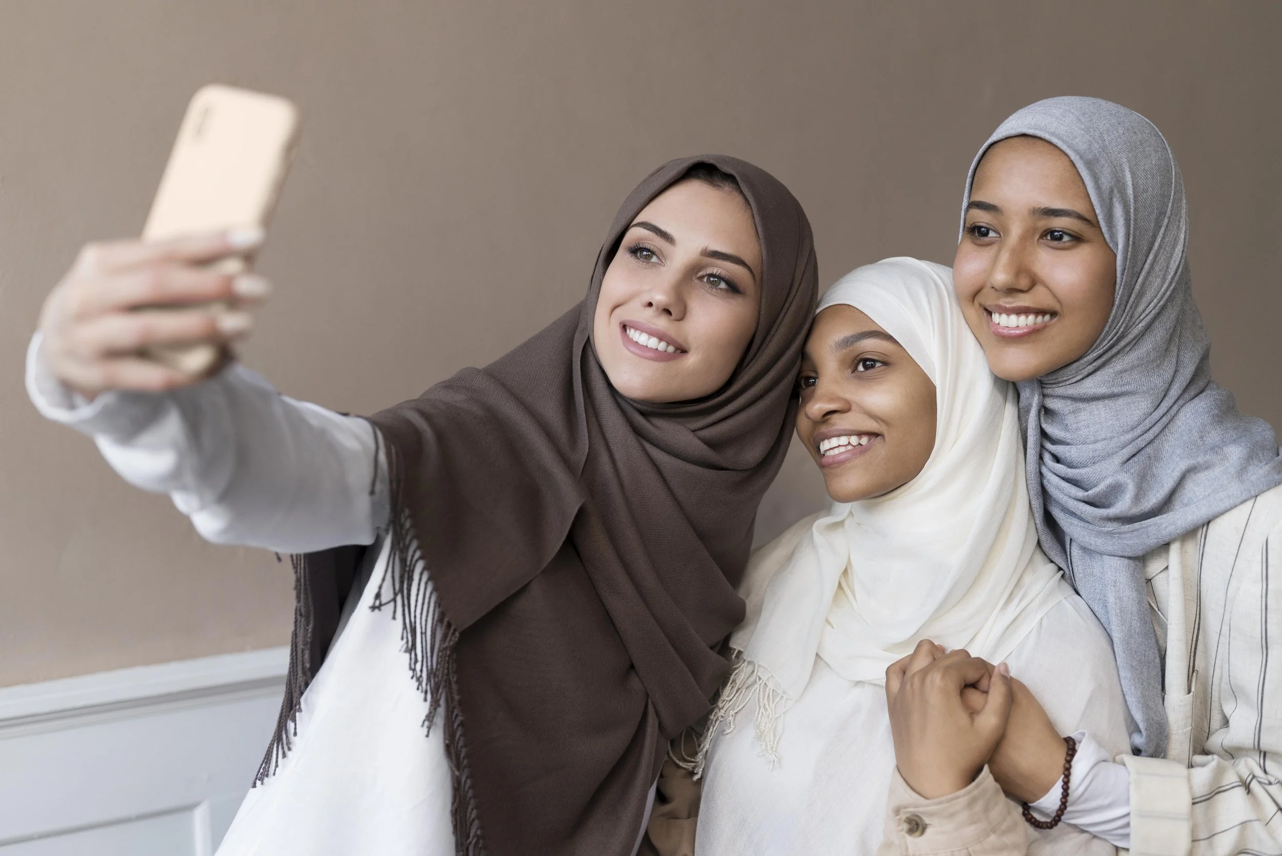 medium-shot-smiley-women-taking-selfie.jpg