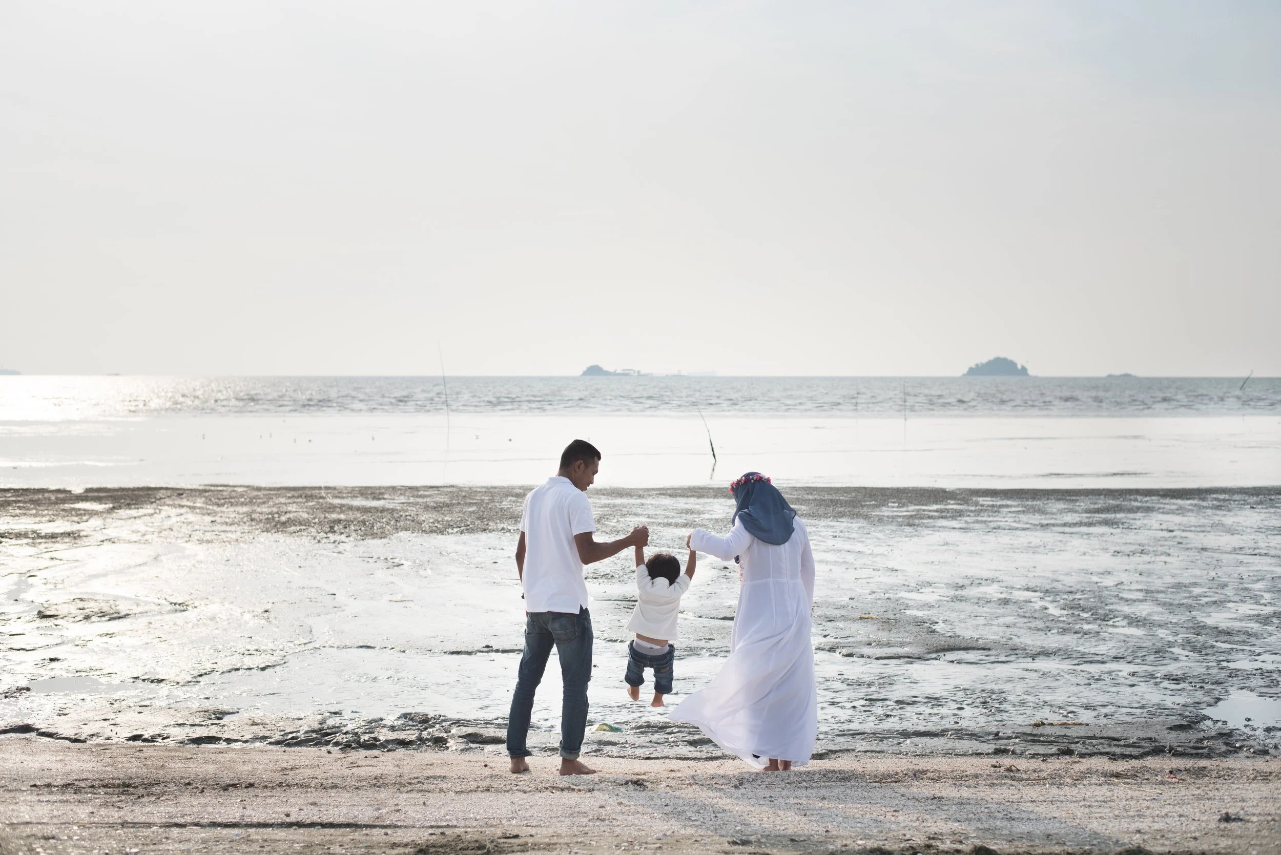 family-beach-against-sky.jpg