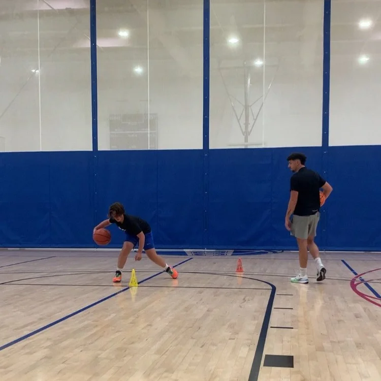 Coach Ran working with players