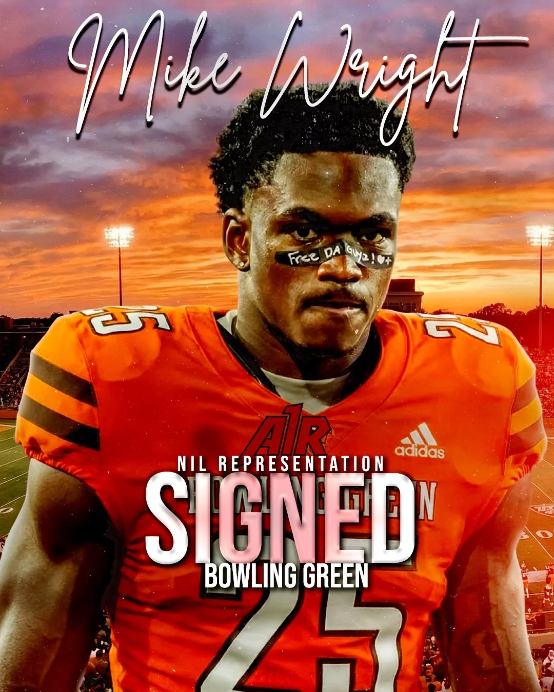 A football player in an orange jersey with the number 25, wearing black eye paint with the words 'Free Da Guy!'. The background shows a stadium with floodlights and a sunset sky.