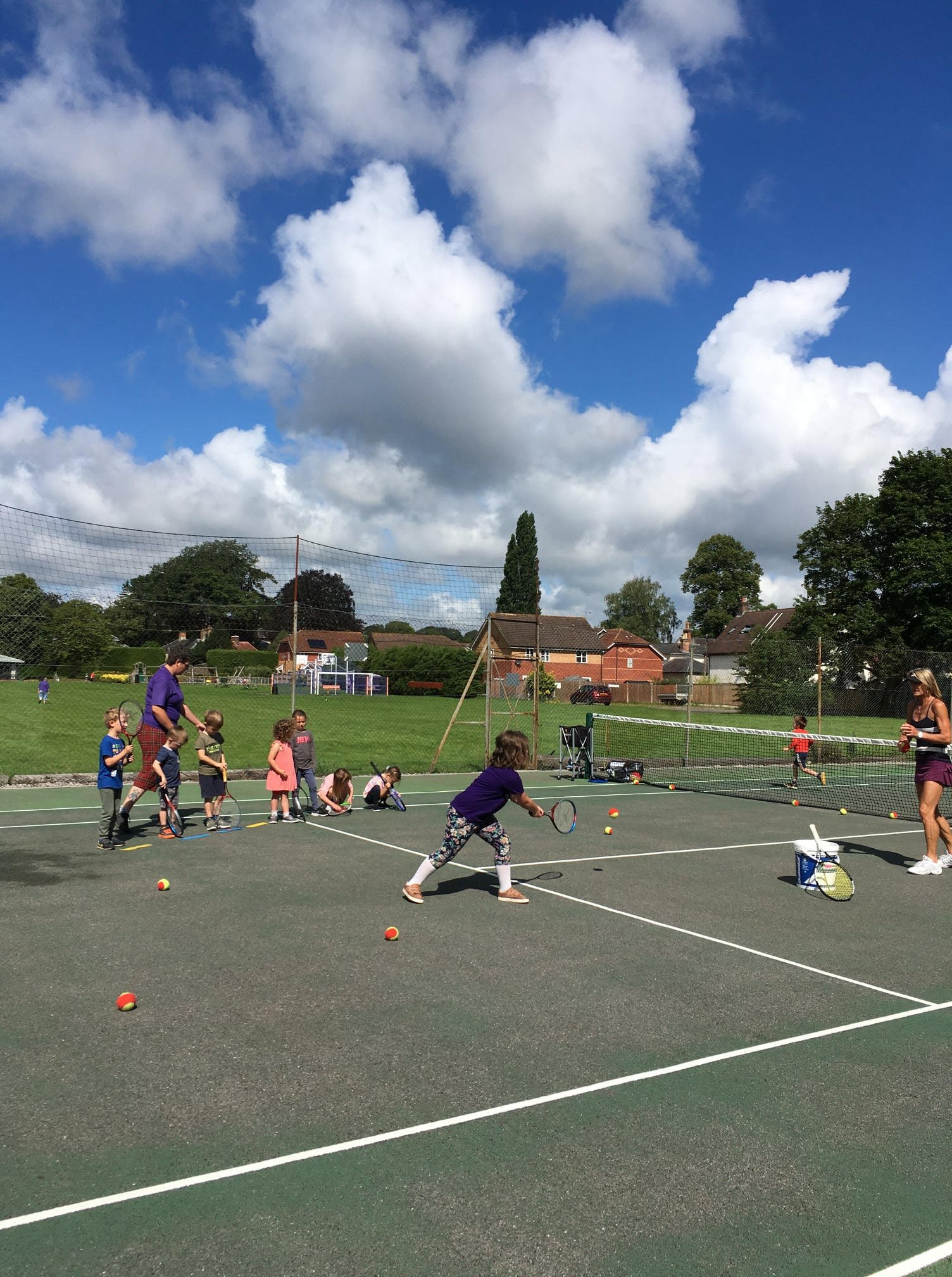 Children having fun at the Tennis club