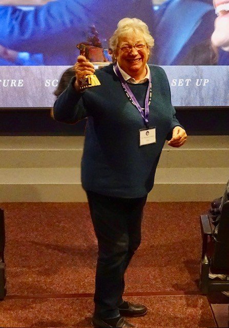 Barbara Tomlinson being awarded her 'Oscar' for all of her efforts and keeping film nights going for over 10 years.