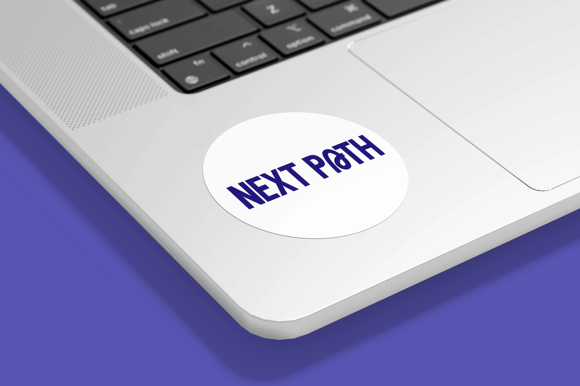 close up of a sticker showing the updated Next Path logo