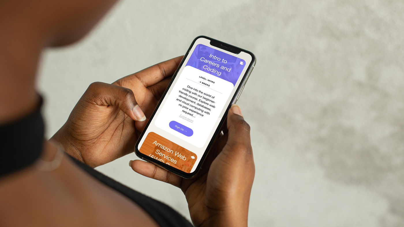 view over woman's shoulder of mobile screenshot of class options