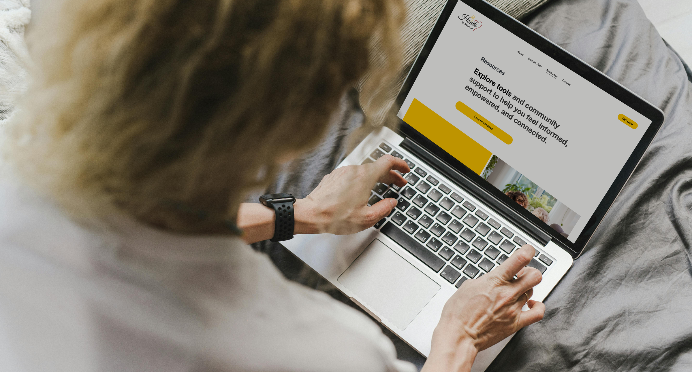 woman on a laptop looking at the resources page