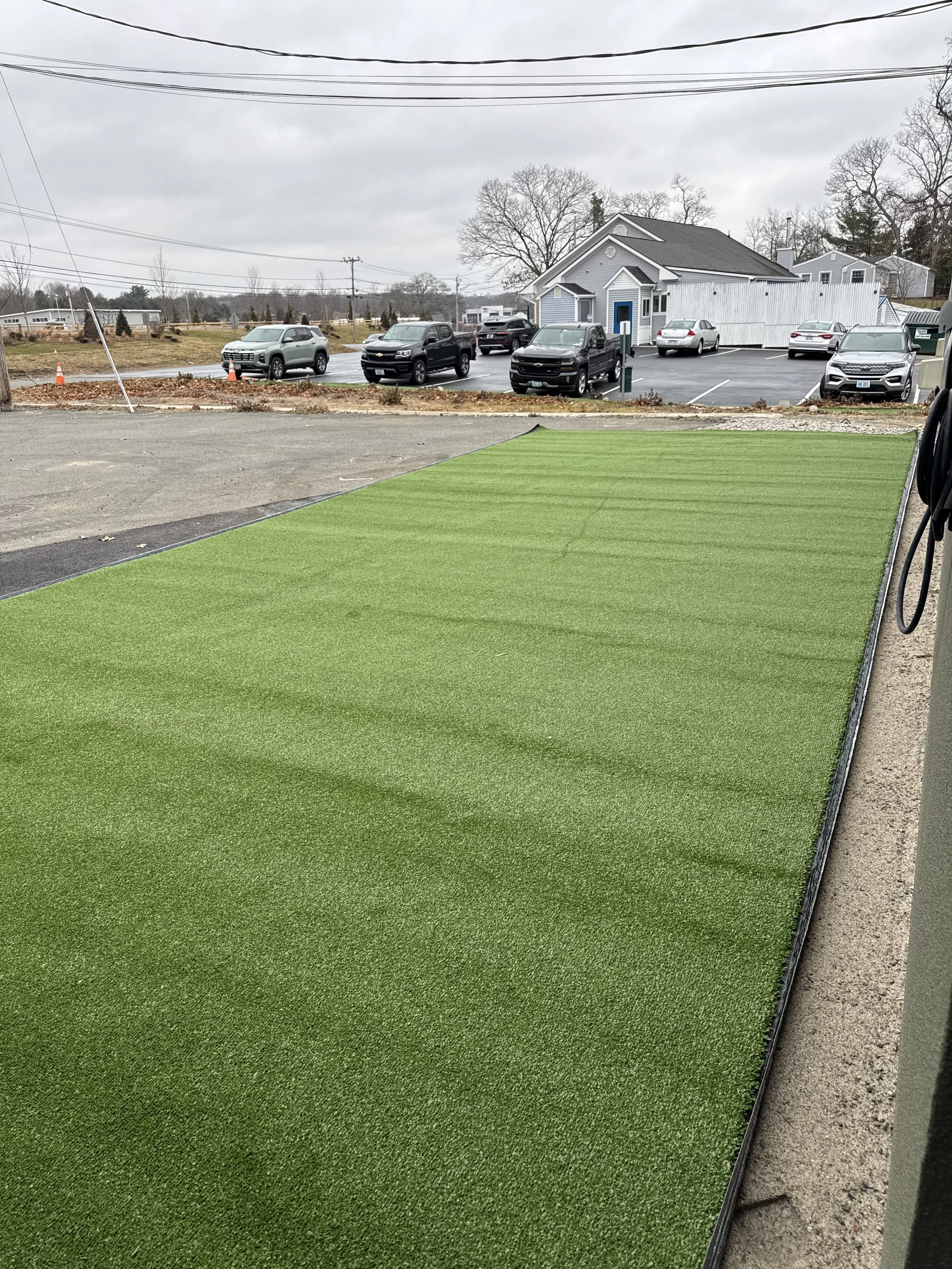 Laying out small dog yard turf!