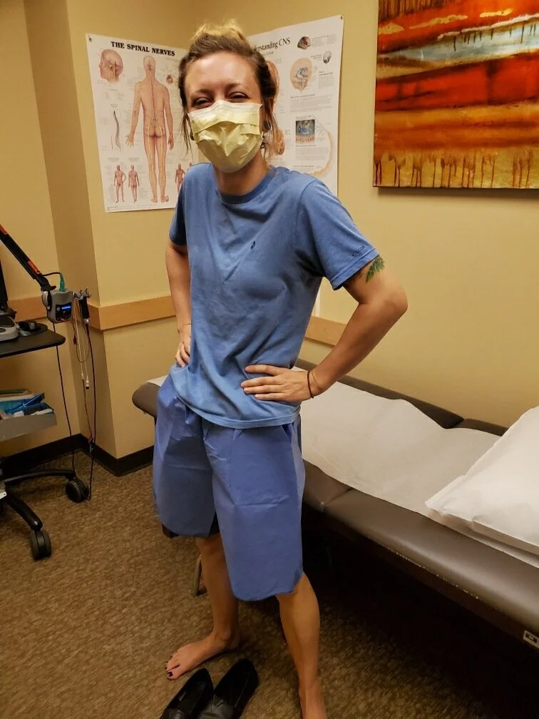 December 2021. Getting my EMG test. I'm leaning against the bench because I couldn't stand unassisted at this point. I was using a walker.