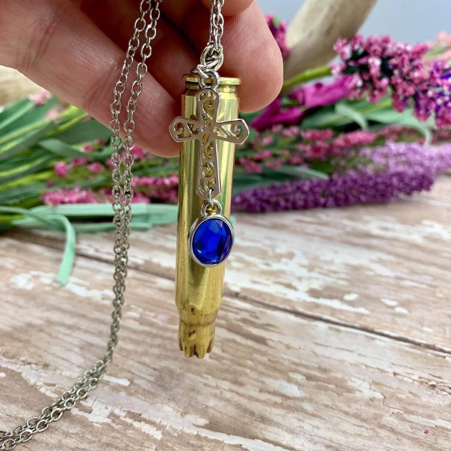 21 gun salute casings made into jewelry.jpeg