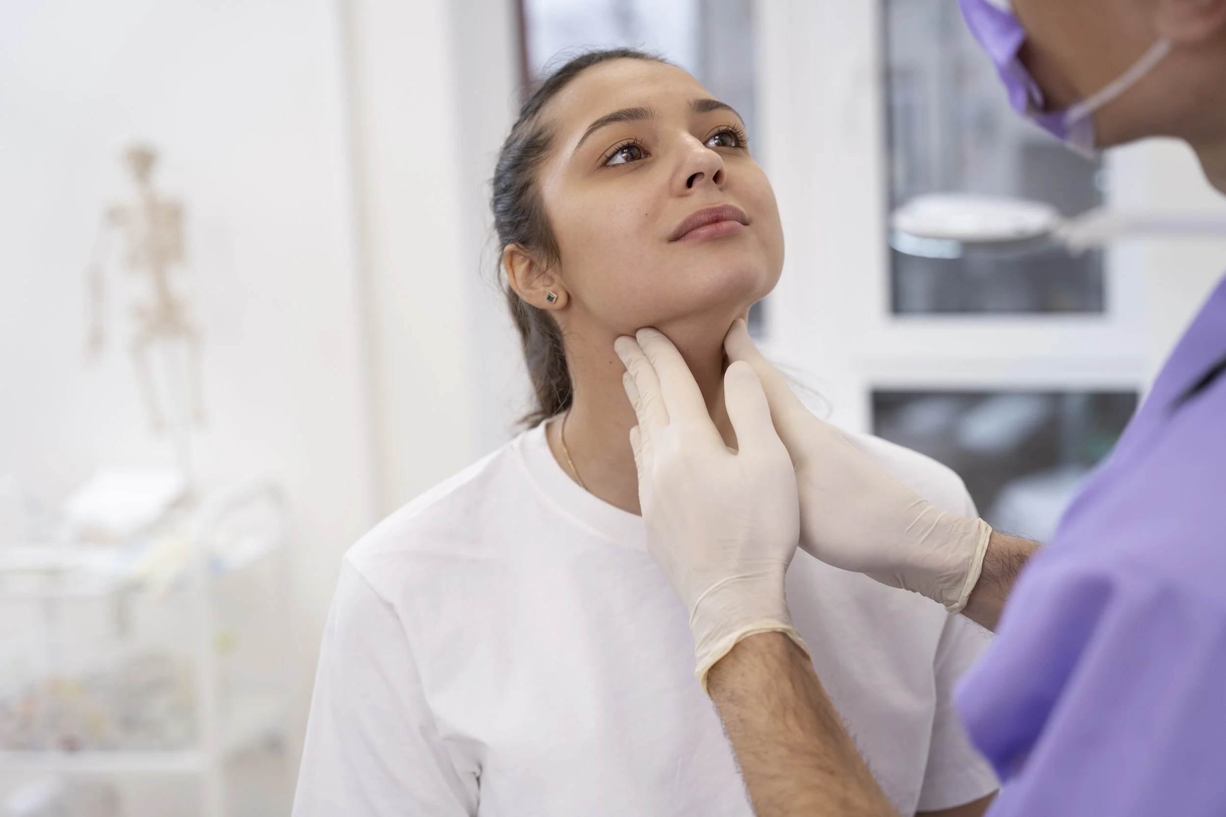 doctor-performing-routine-medical-checkup.jpg