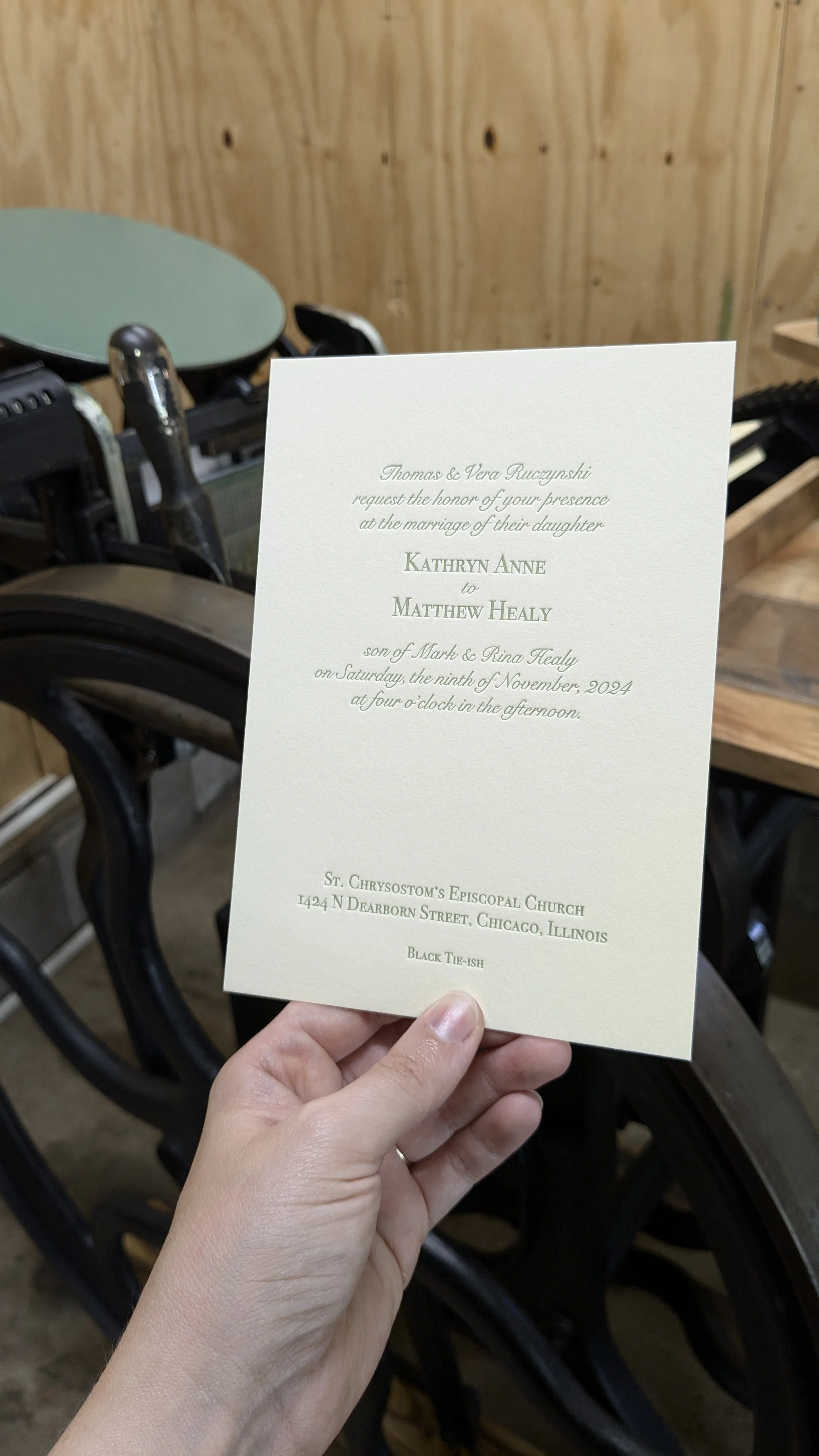 Elegant formal letterpress wedding invitation featuring classic typography and refined layout