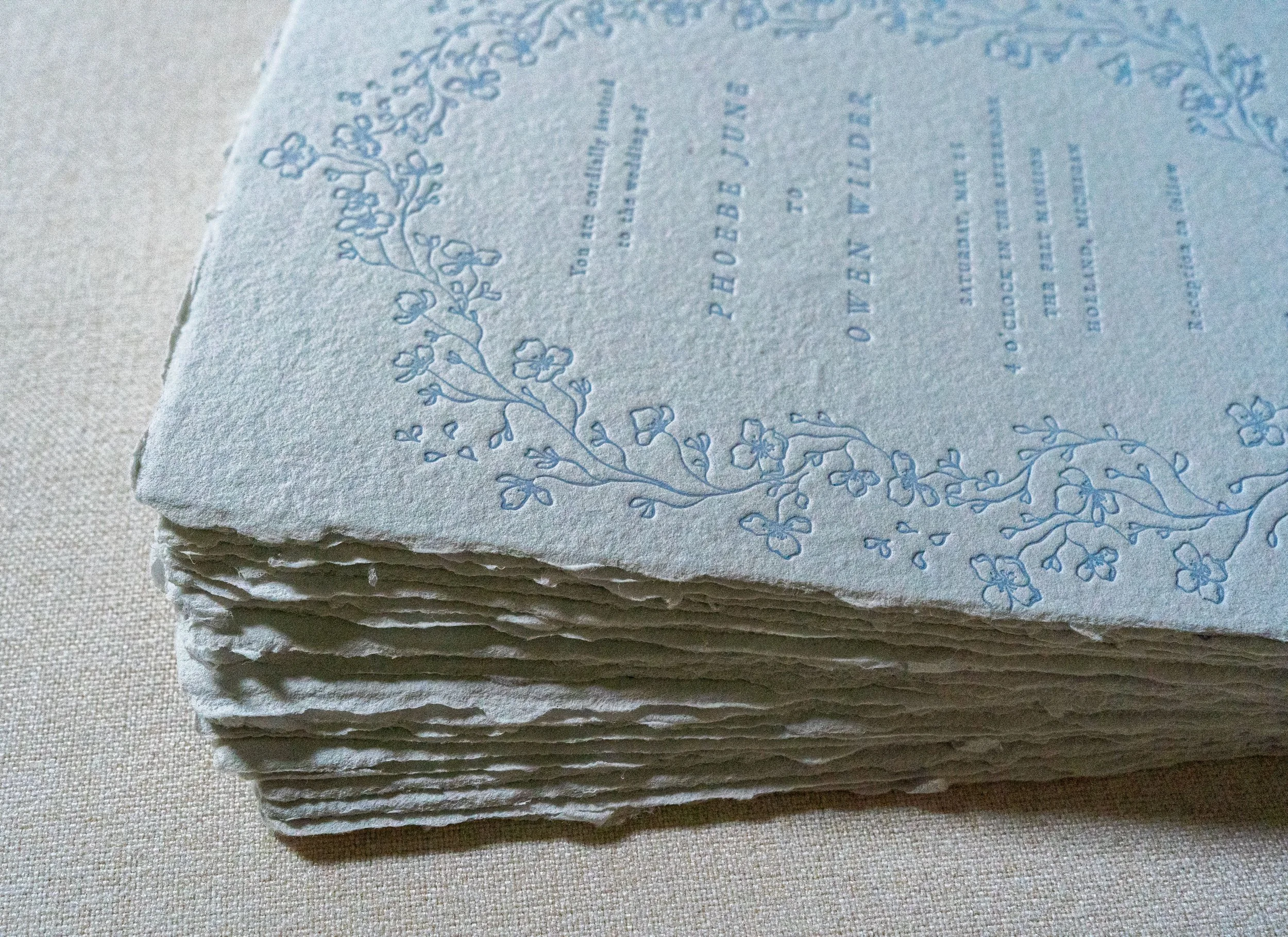 semi custom invitation suites on handmade paper