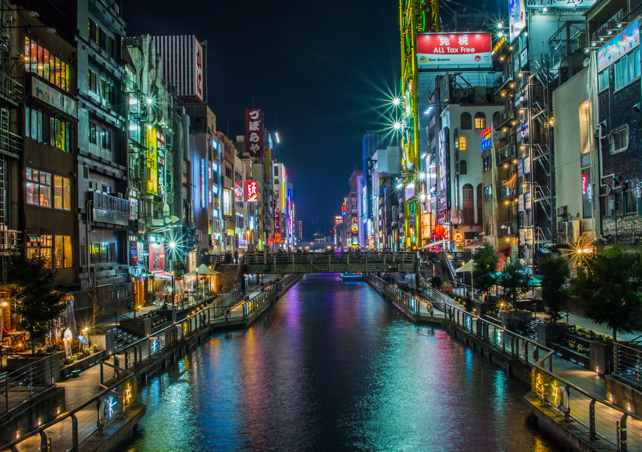The Dotonbori River lights up at night for a spectacular view
