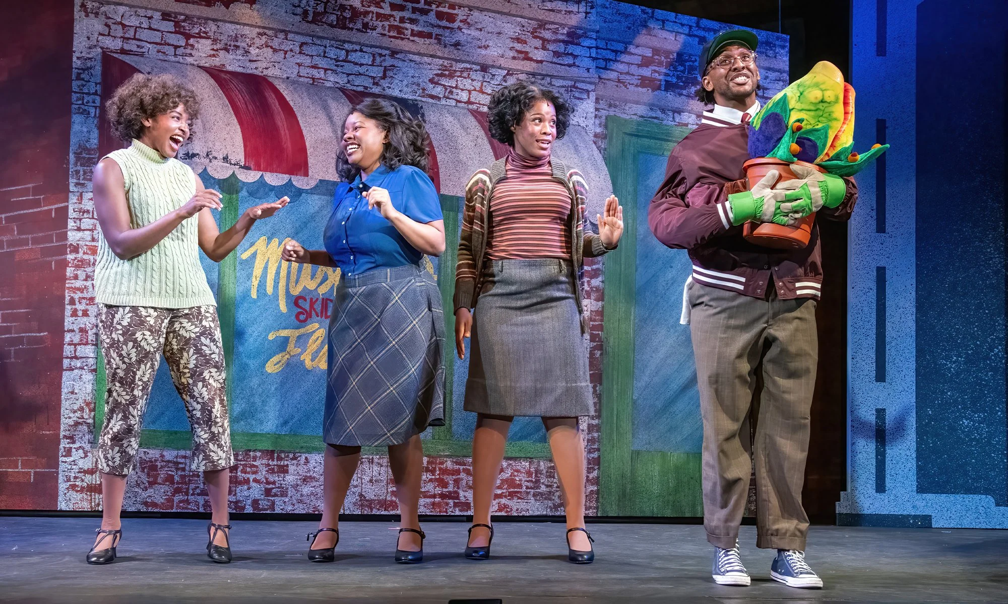 Crystal in Little Shop of Horrors at Theatre by The Sea 
Wig: Erin Kennedy Lunsford, Maura Monaghan
Lighting: Westin Wilkerson
Scenic: Cassie McKnight
