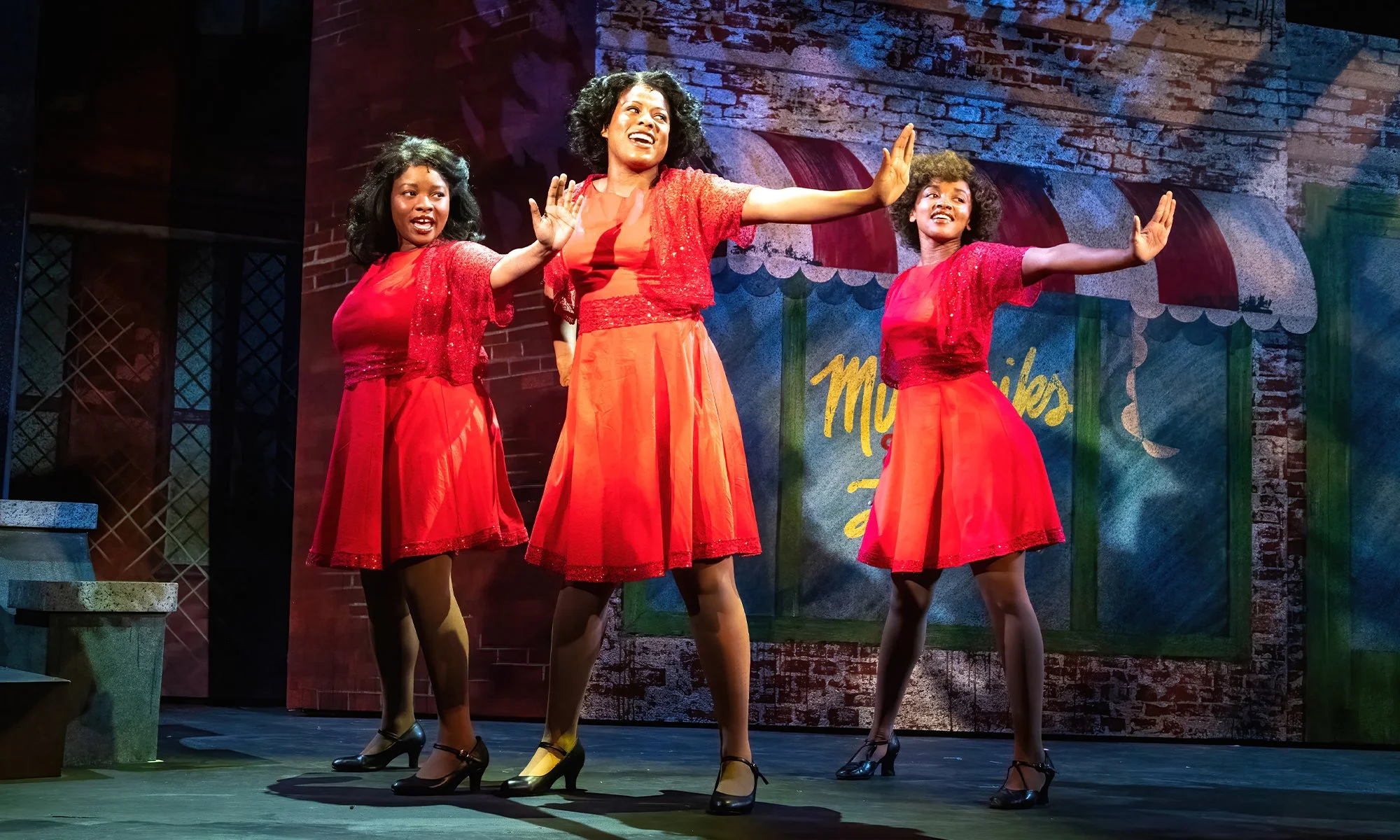 Crystal in Little Shop of Horrors at Theatre by The Sea 
Wig: Erin Kennedy Lunsford, Maura Monaghan
Lighting: Westin Wilkerson
Scenic: Cassie McKnight