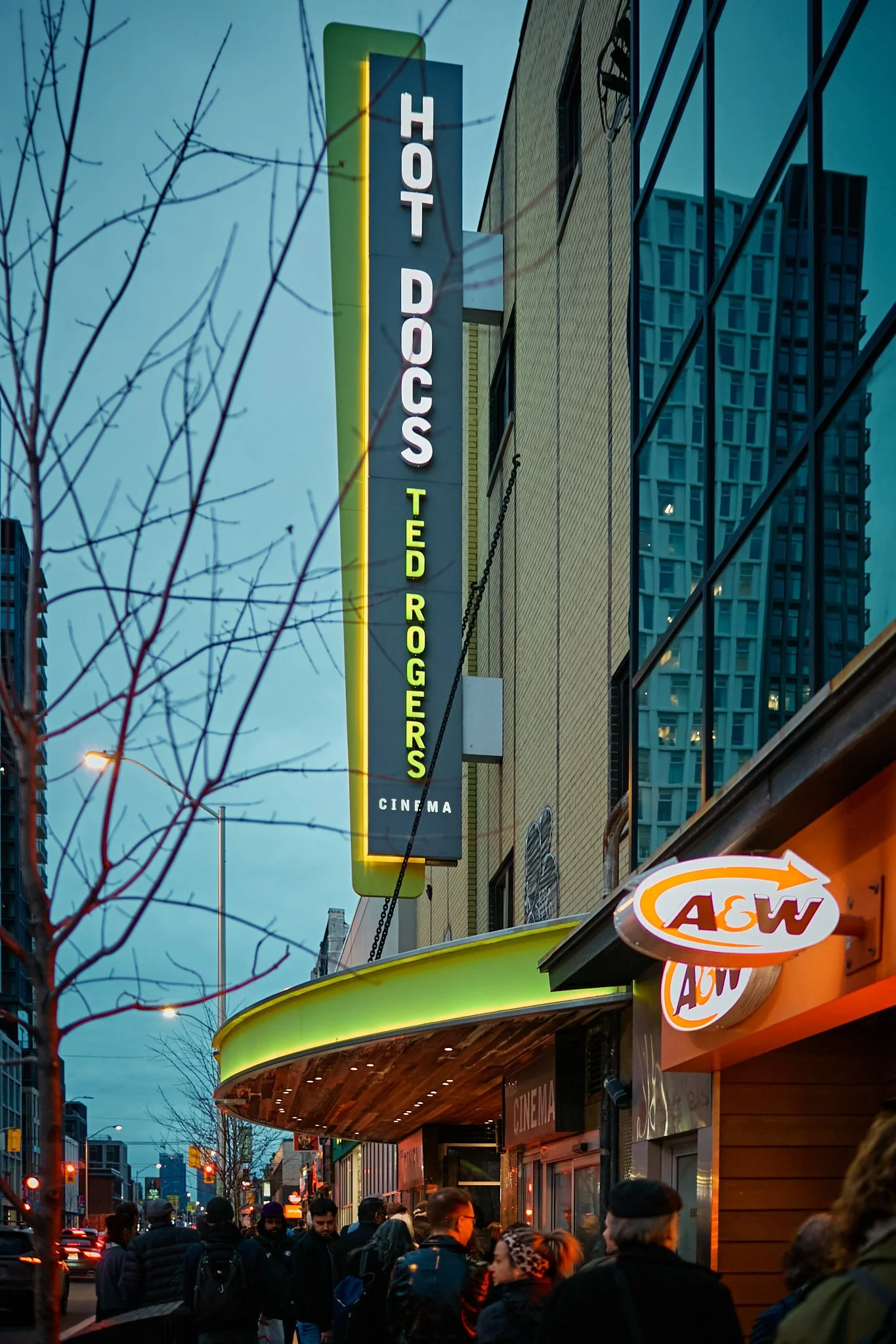 A line of people heading into Hot Docs Cinema